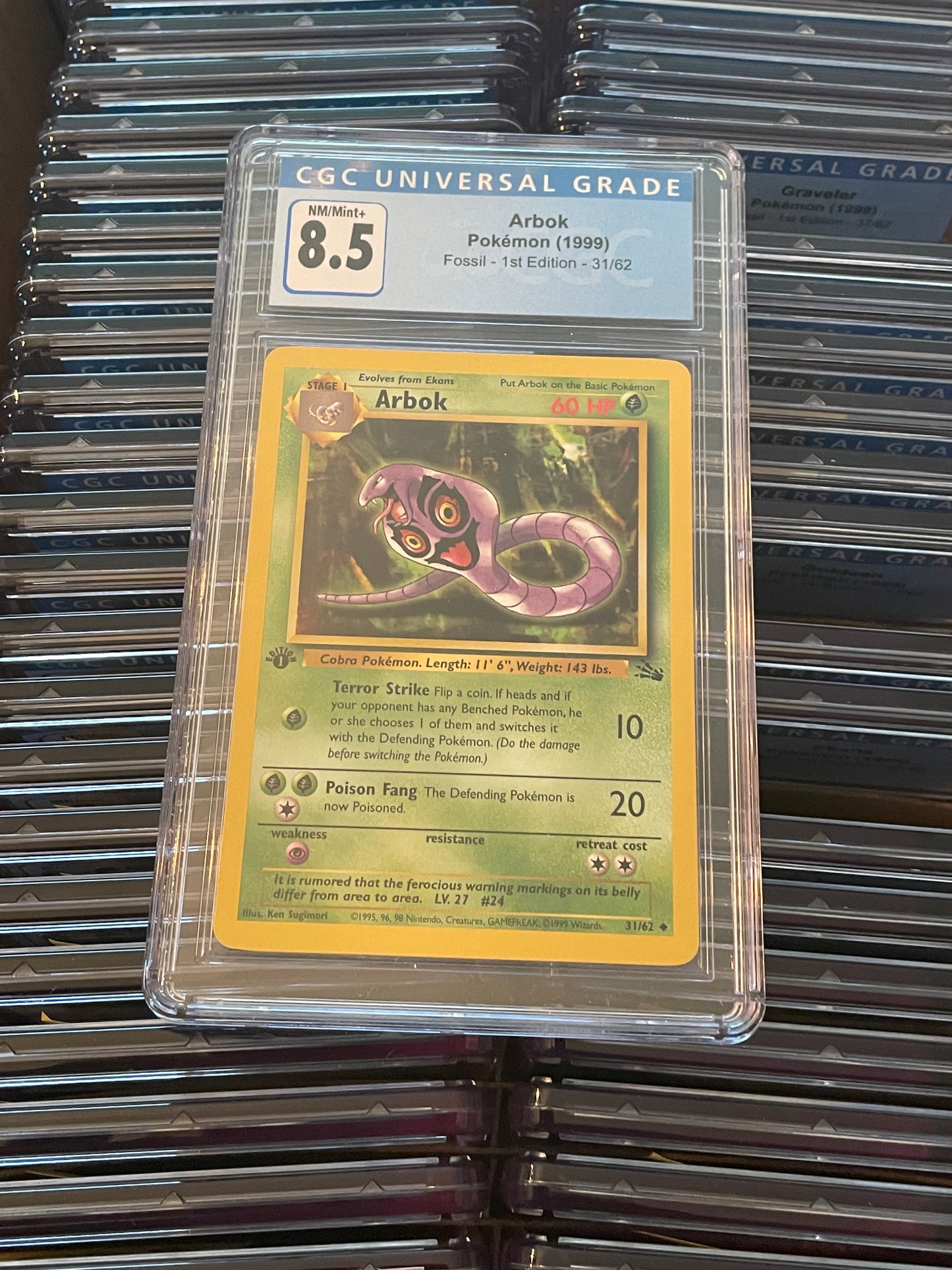 Arbok Fossil 1st Edition 31/62 Pokémon (1999) CGC 8.5